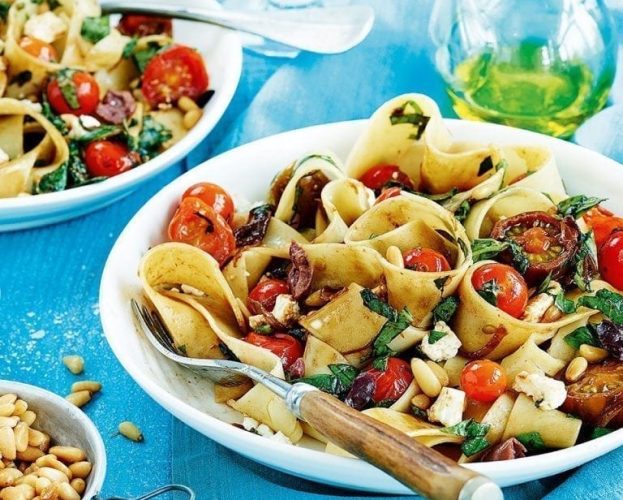 Tomato, feta and olive pasta pappardelle on a plate
