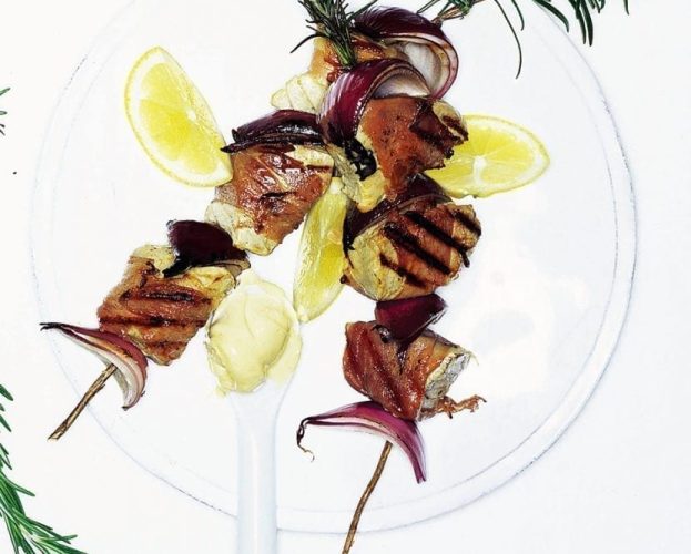 Fresh tuna steaks on rosemary skewers