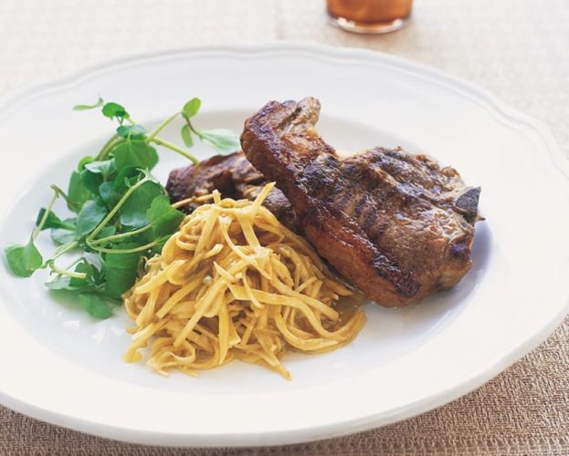 Lamb chop on a white plate