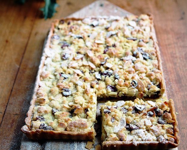 A streusel baked in a rectangle, with a square slice cut out