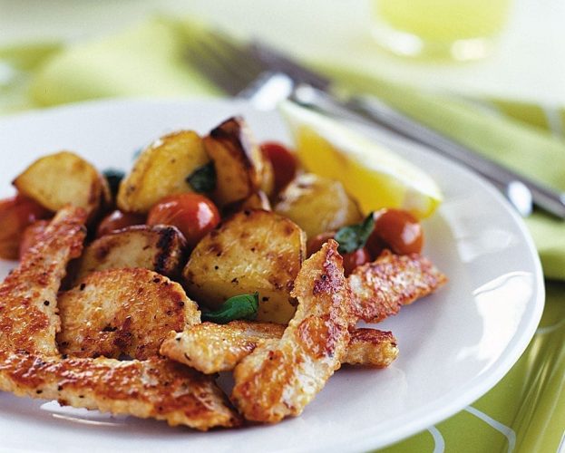 Parmesan turkey with roast tomato and basil potatoes