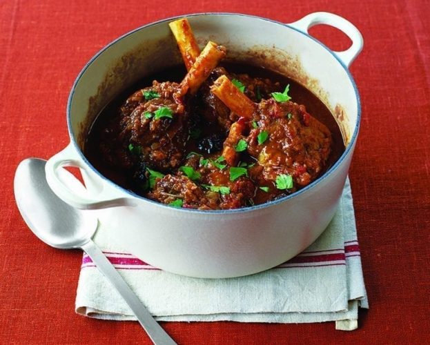 Moroccan lamb shanks in a white pot