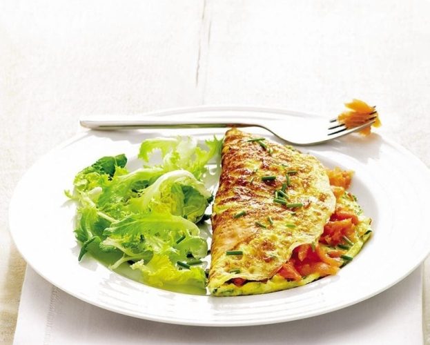 Smoked salmon omelette on a white plate