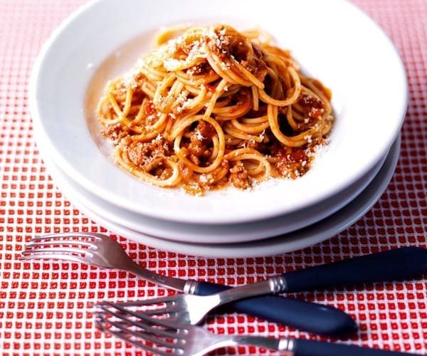 Easy spaghetti bolognese on a white plate