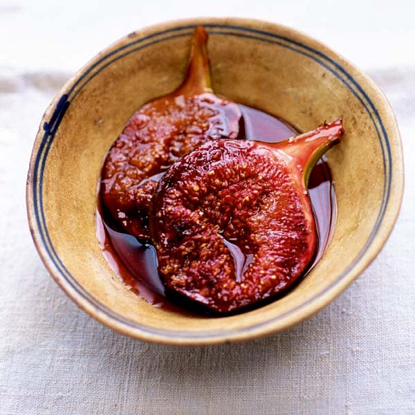 Nigel Slater's figs in red wine and jelly - figs sliced in half are shown in a bowl