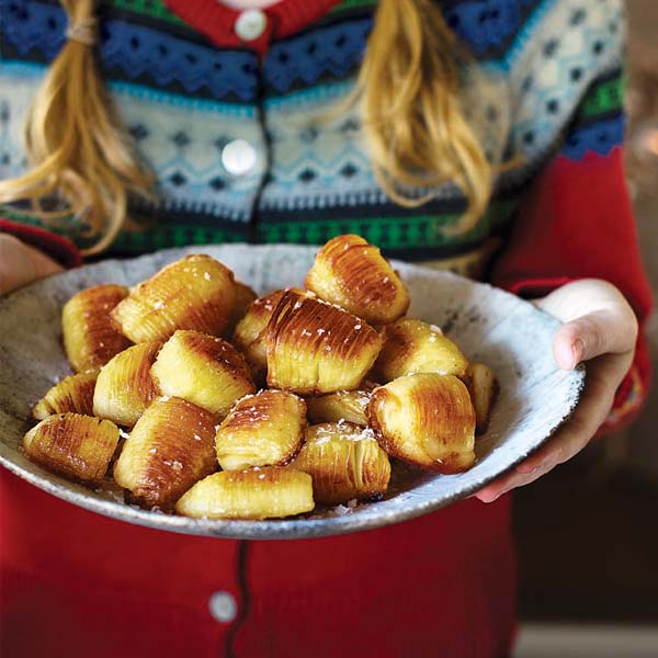 Hasselback potatoes in a bowl