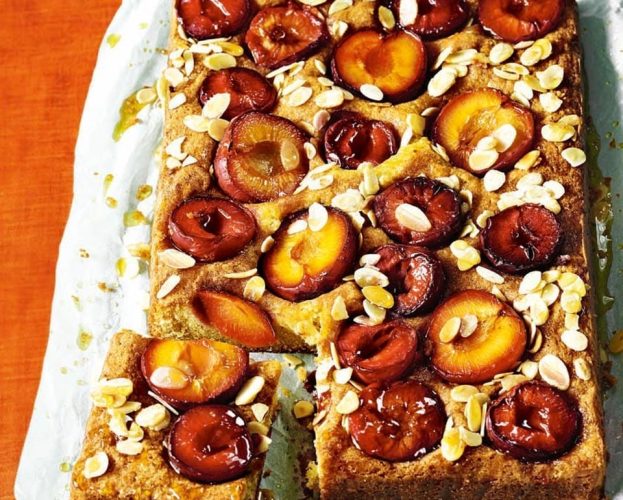 Plum cake with custard, shown on baking paper
