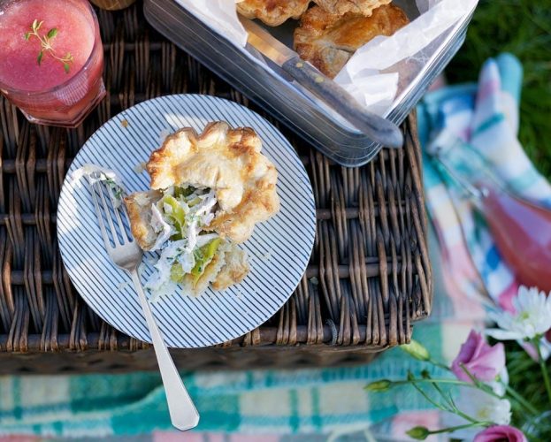 Individual chicken and leek pies in a picnic setting