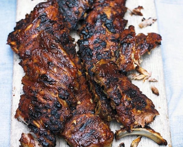 Slow roast baby back ribs on a platter