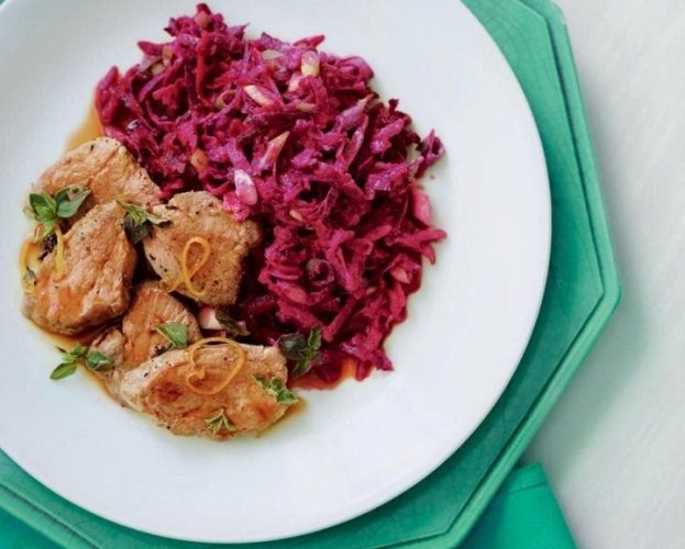 Pork tenderloin with bright-coloured coleslaw