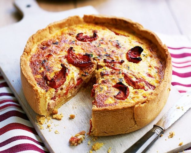 Make-ahead cheddar quiche, shown on a chopping board