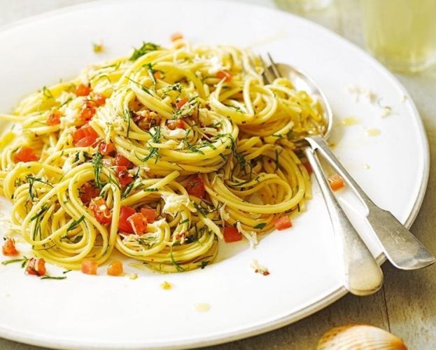 Crab linguine on a white plate
