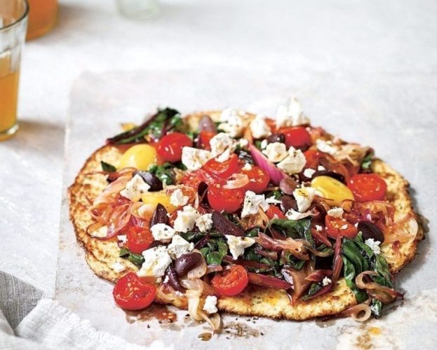 Grain-free cauliflower 'pizza' with chard and olives