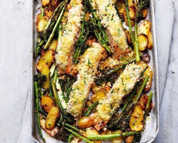 Tray-roast salmon and vegetables with crème fraîche and crumbs