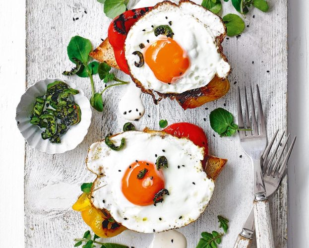 Fried eggs on toast with grilled peppers and aioli