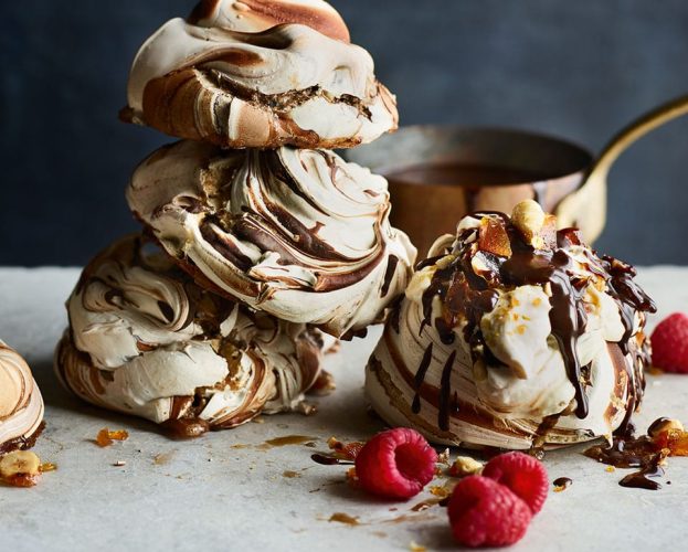 Choc swirl meringues with praline and chocolate caramel sauce