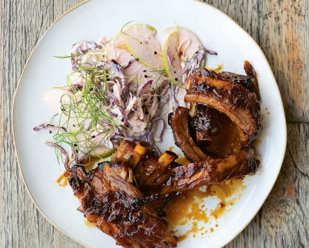 Sweet and sticky ribs with apple wedges
