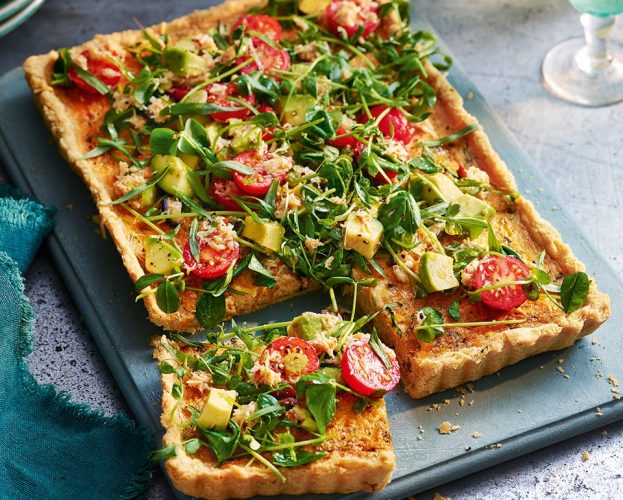 Crab and gruyère tart with pea shoot and avocado salad