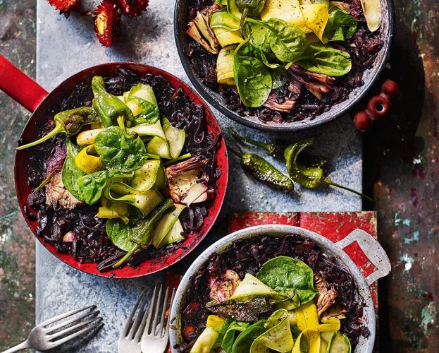 black rice paella with artichokes