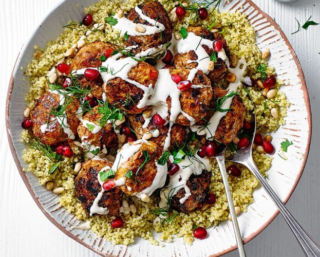Harissa-spiced meatballs with houmous and pomegranate seeds