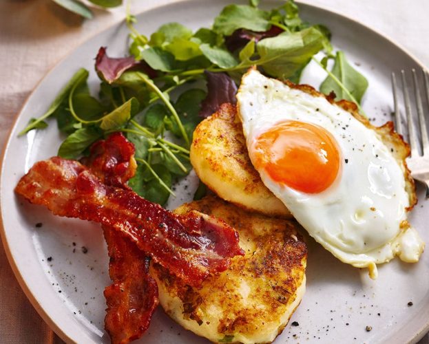 Potato champ cakes with crispy bacon and a fried egg