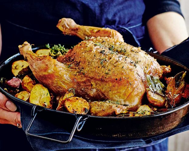 Roast chicken with lemon, caramelised garlic and thyme
