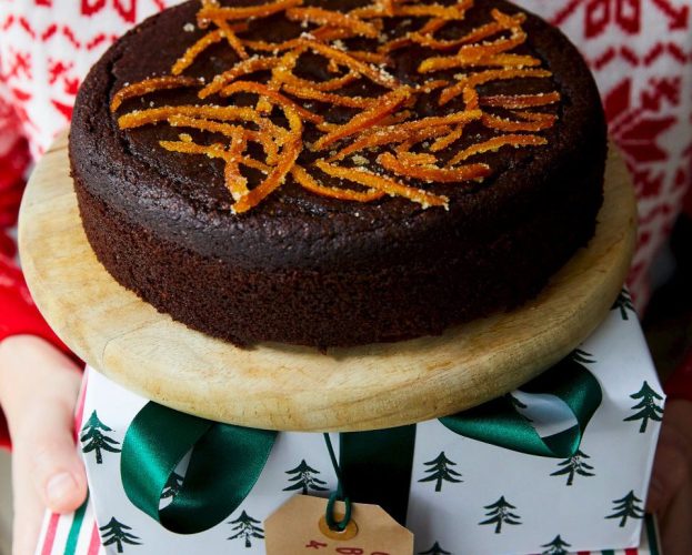 A dense chocolate cake toped with candied orange peel