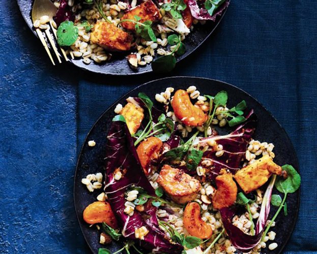 Clementine and halloumi salad on two plates
