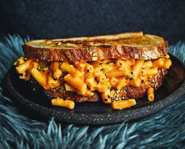 A toastie overflowing with mac and cheese