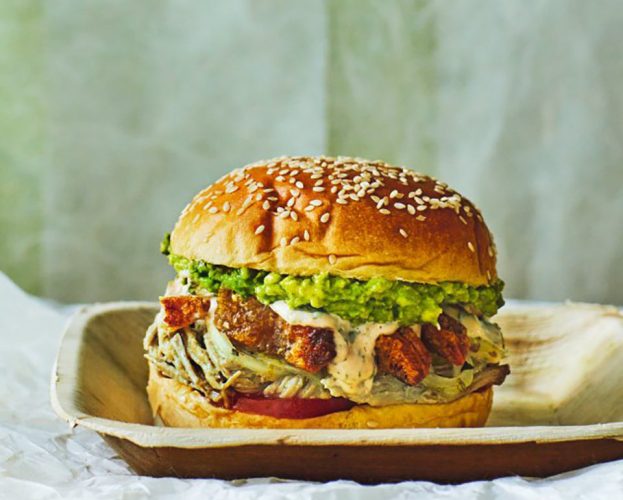 Leftover roast pork in a bun with avocado and tomato