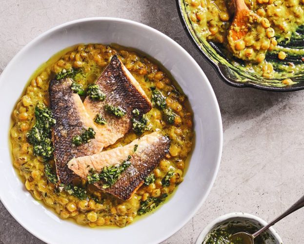 Yellow dal with sea bass, shown in a white bowl