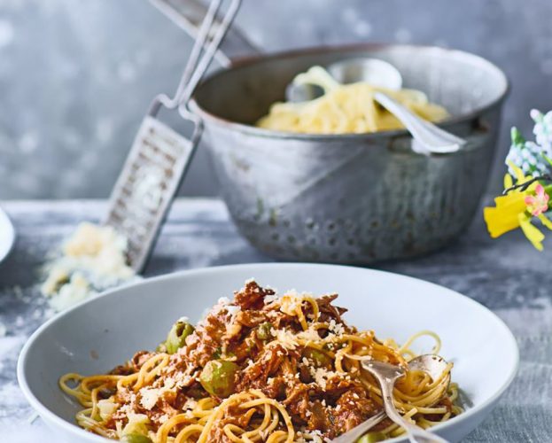 A bowl of spaghetti with lamb ragù