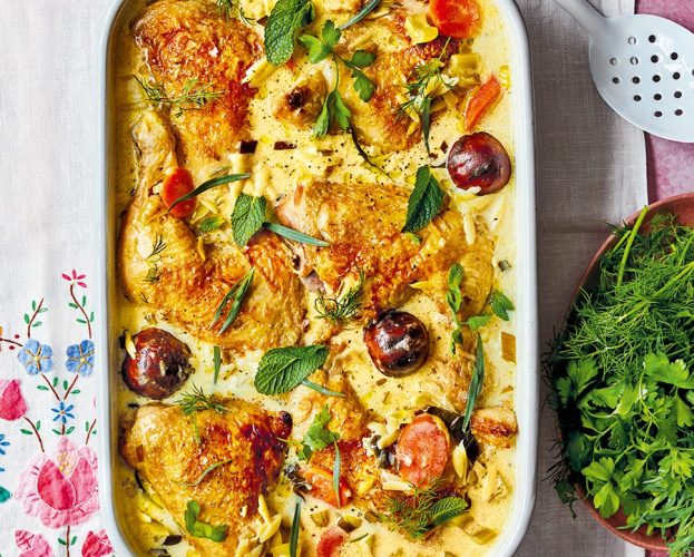 A dish of braised chicken in kefir, topped with herbs