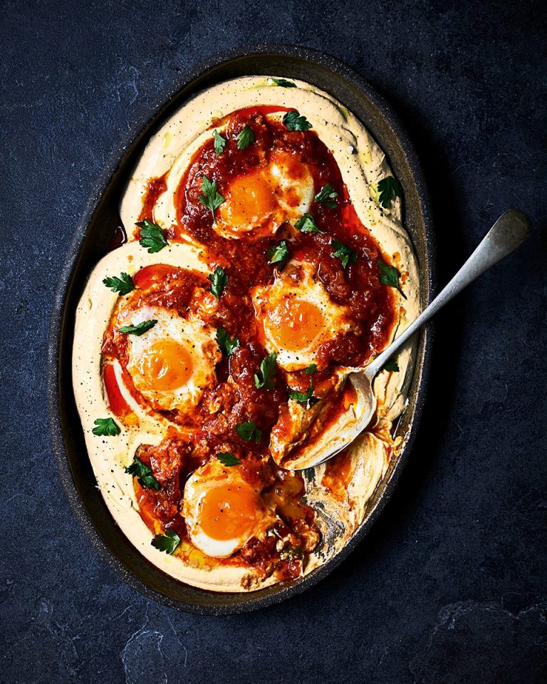 Houmous with tomato and mango chutney- braised eggs on a platter