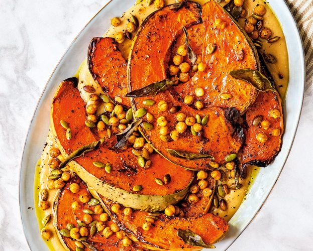 Air fryer pumpkin with creamy beans, crispy chickpeas and sage on a platter