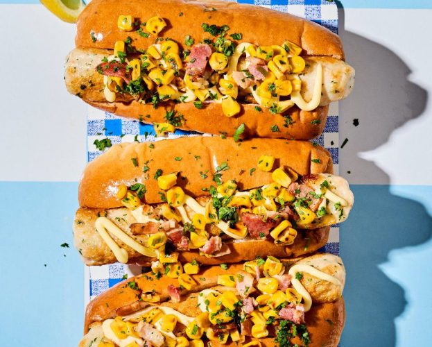 Prawn and crab ‘hot dogs’ with sweetcorn and bacon salsa