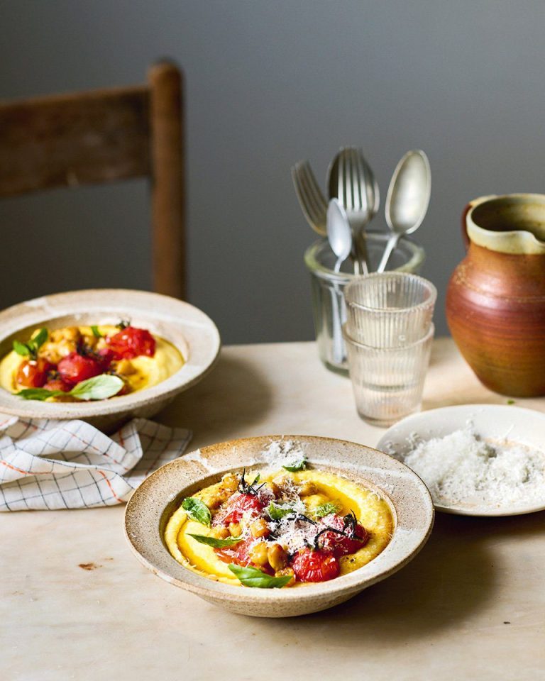 Blistered tomatoes and chickpeas on creamy polenta